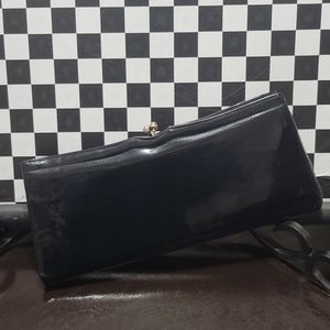 Womans black clutch